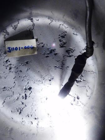 Aluminium cylinder with previous water ingress damage to base region following leaning by tumbling. Inspectors decision 'fail' corrosion pits exceed limit Aluminium cylinder with previous water ingress damage to base region following leaning by tumbling. Inspectors decision 'fail' corrosion pits exceed limit