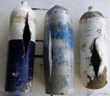 Condemned scuba cylinders bursted to convince African natives that they are no longer safe to use.