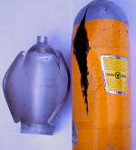 Exploded scuba tank bomb. burst testing(LHS) internal corrosion(rhs) 